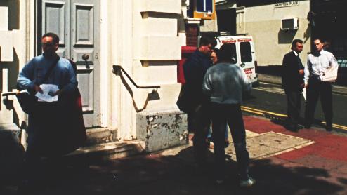 Xemu handling out
leaflets, some clams in conversation