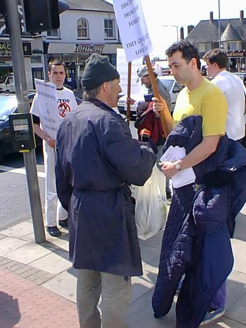 Protesters and obnoxious passer-by