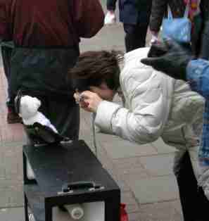 DSA clamette photographing the protesting mascot