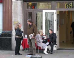 Two leafletting clams and passer-by(?) on cans
